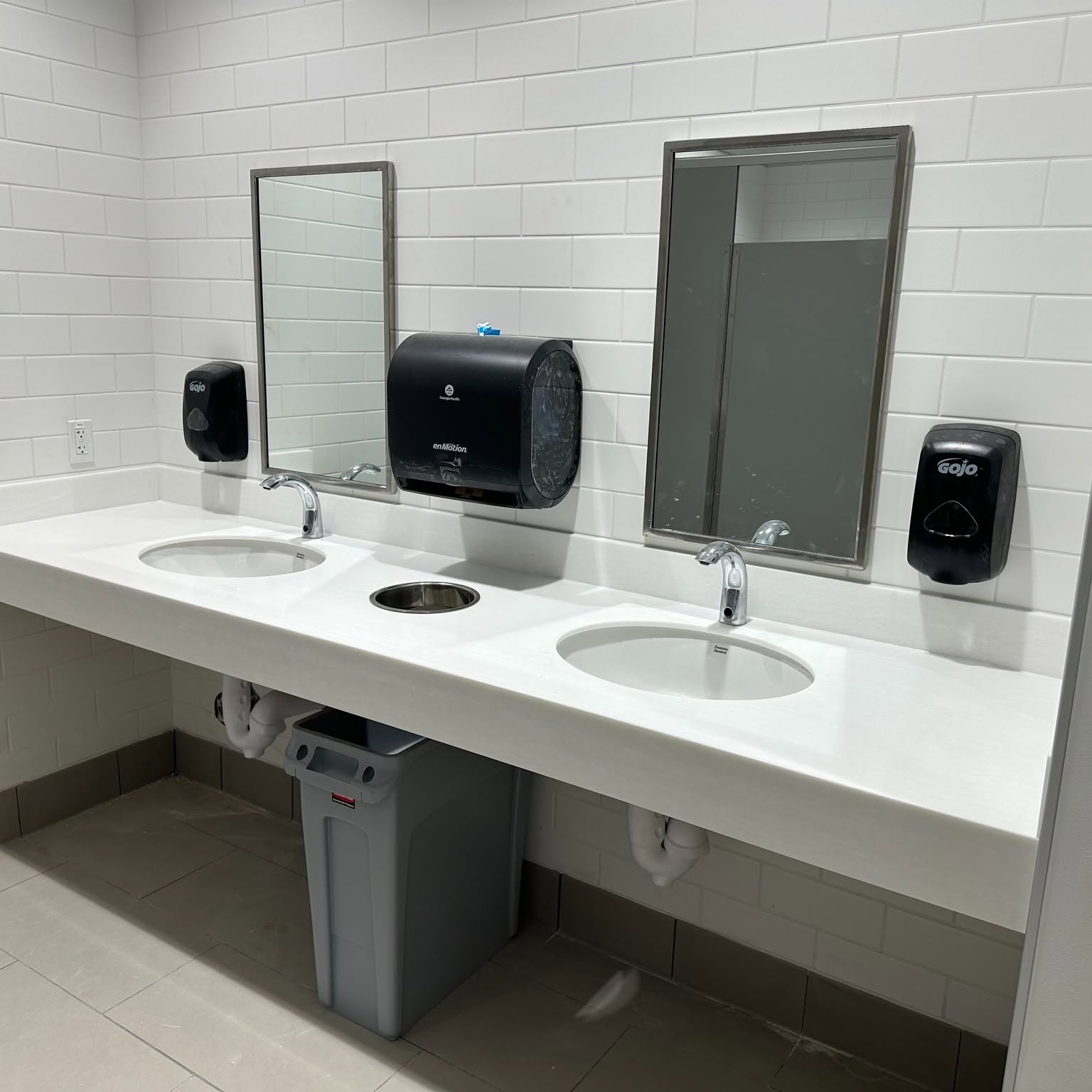 Commercial restroom sinks installed by Holman's Quality Plumbing