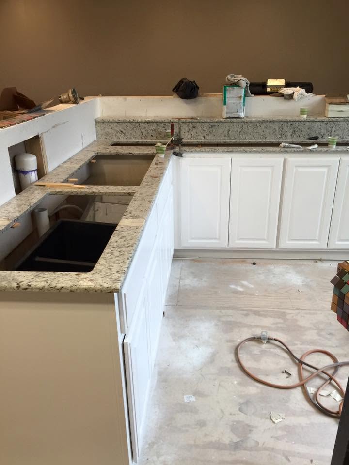 Kitchen plumbing work during a remodeling project