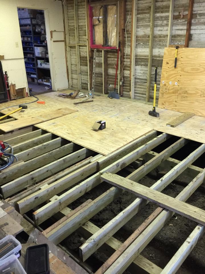 New construction plumbing installed beneath the floor