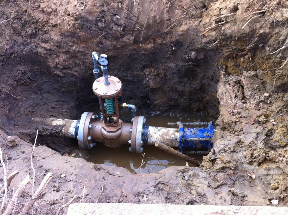 Underground backflow assembly installed by HQP